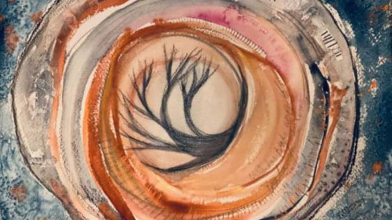 watercolor painting of a spiral in autumn colors with a bare tree in the center